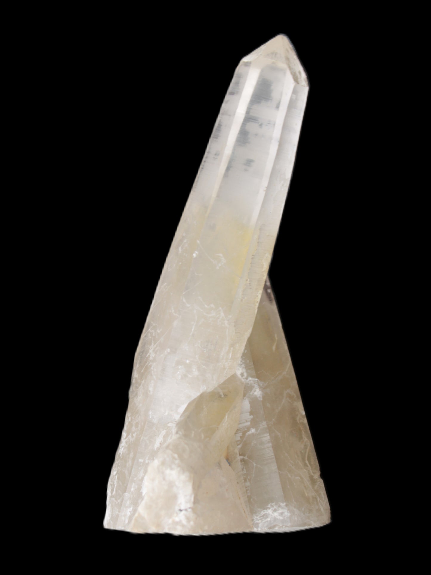 Quartz backbone crystal cluster 93mm 89g in sunlight