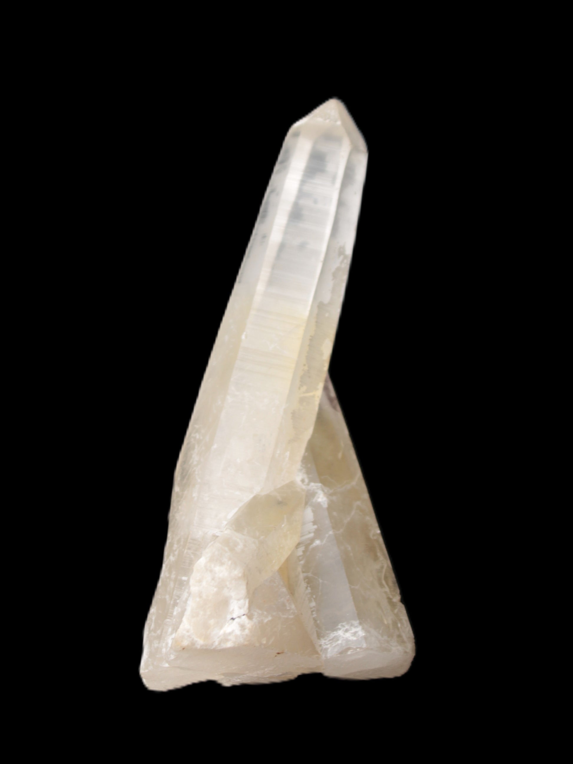 Quartz backbone crystal cluster 93mm 89g in sunlight