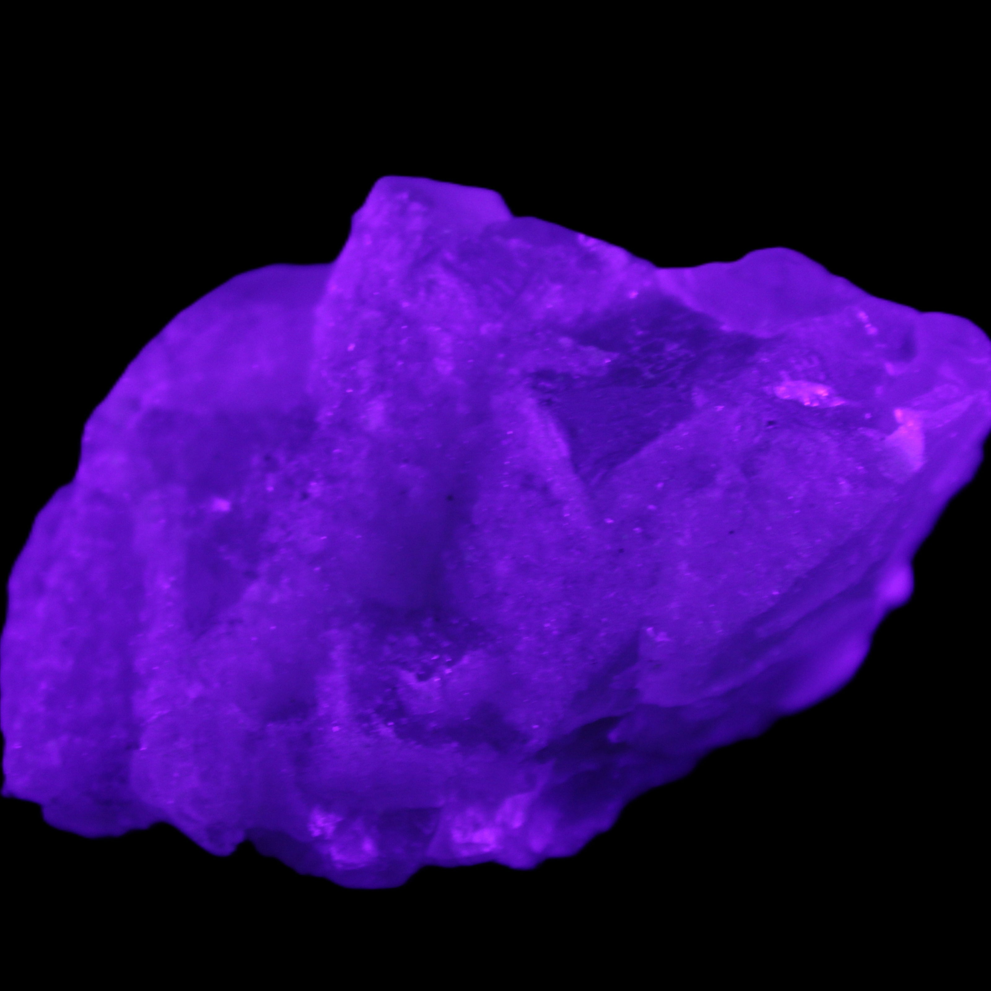 Fluorite translucent cubic cluster 112g in UV light- Rocks and Things Store