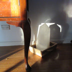 Clear White Quartz obelisk 14040g inside in a stray low evening sunbeam