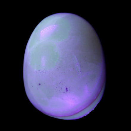 Yellow Banded Calcite egg 118g in UV light - Rocks and Things Store