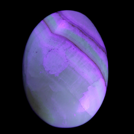 Yellow Banded Calcite egg 118g in UV light - Rocks and Things Store