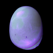 Yellow Banded Calcite egg 118g in UV light - Rocks and Things Store