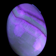 Yellow Banded Calcite egg 118g in UV light - Rocks and Things Store