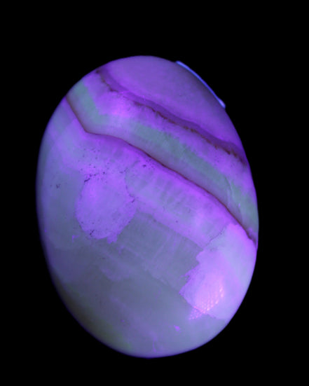 Yellow Banded Calcite egg 118g in UV light - Rocks and Things Store