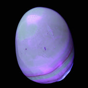 Yellow Banded Calcite egg 118g in UV light - Rocks and Things Store