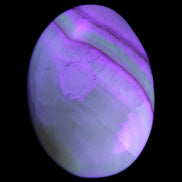 Yellow Banded Calcite egg 118g in UV light - Rocks and Things Store