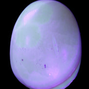 Yellow Banded Calcite egg 118g in UV light - Rocks and Things Store