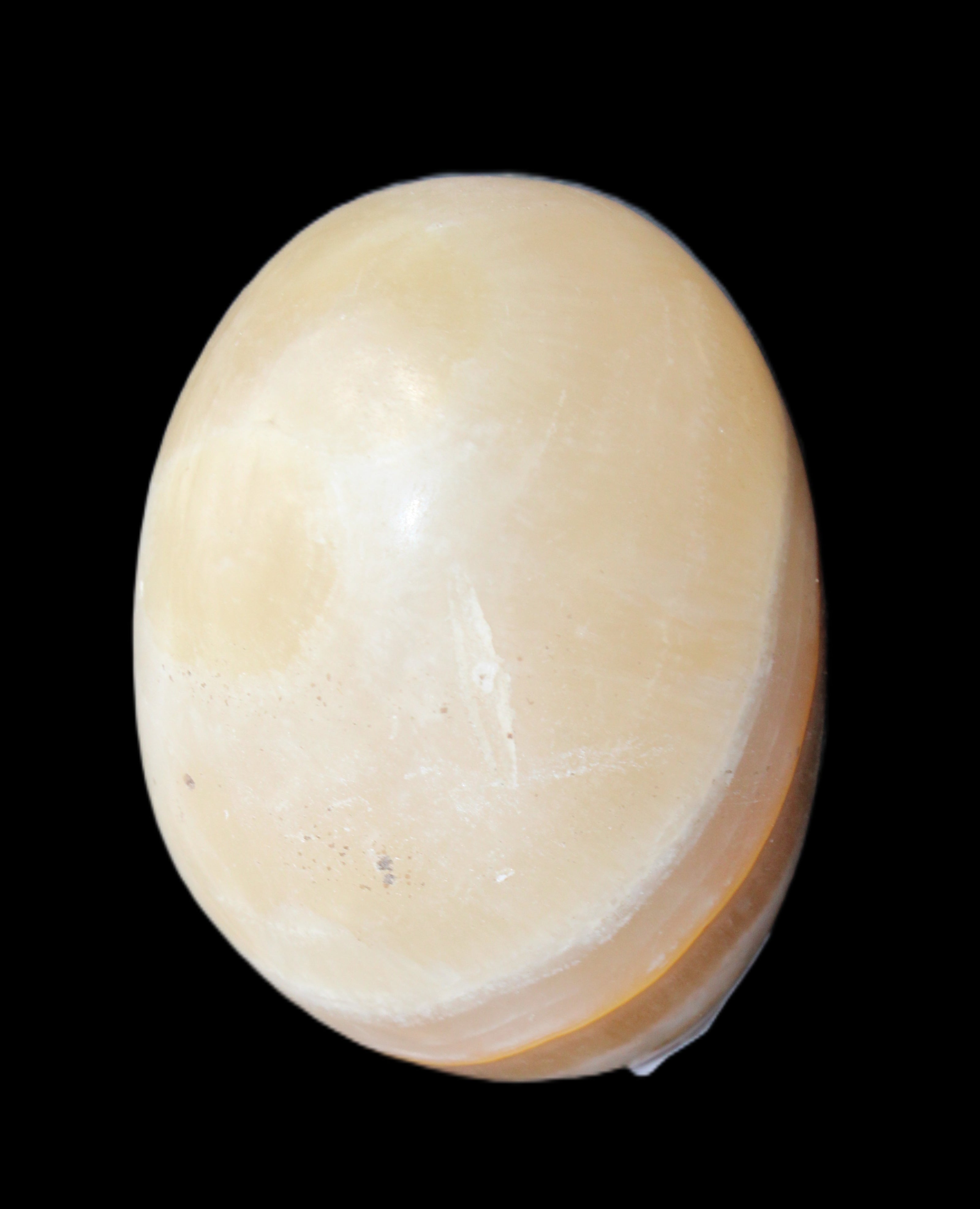Yellow Banded Calcite egg 118g in sunlight - Rocks and Things Store