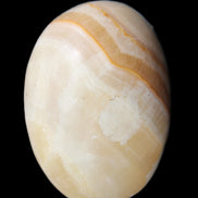 Yellow Banded Calcite egg 118g in sunlight - Rocks and Things Store