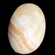 Yellow Banded Calcite egg 118g in sunlight - Rocks and Things Store