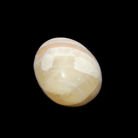 Yellow Afghan Jade onyx egg 118g in sunlight - Rocks and Things Store