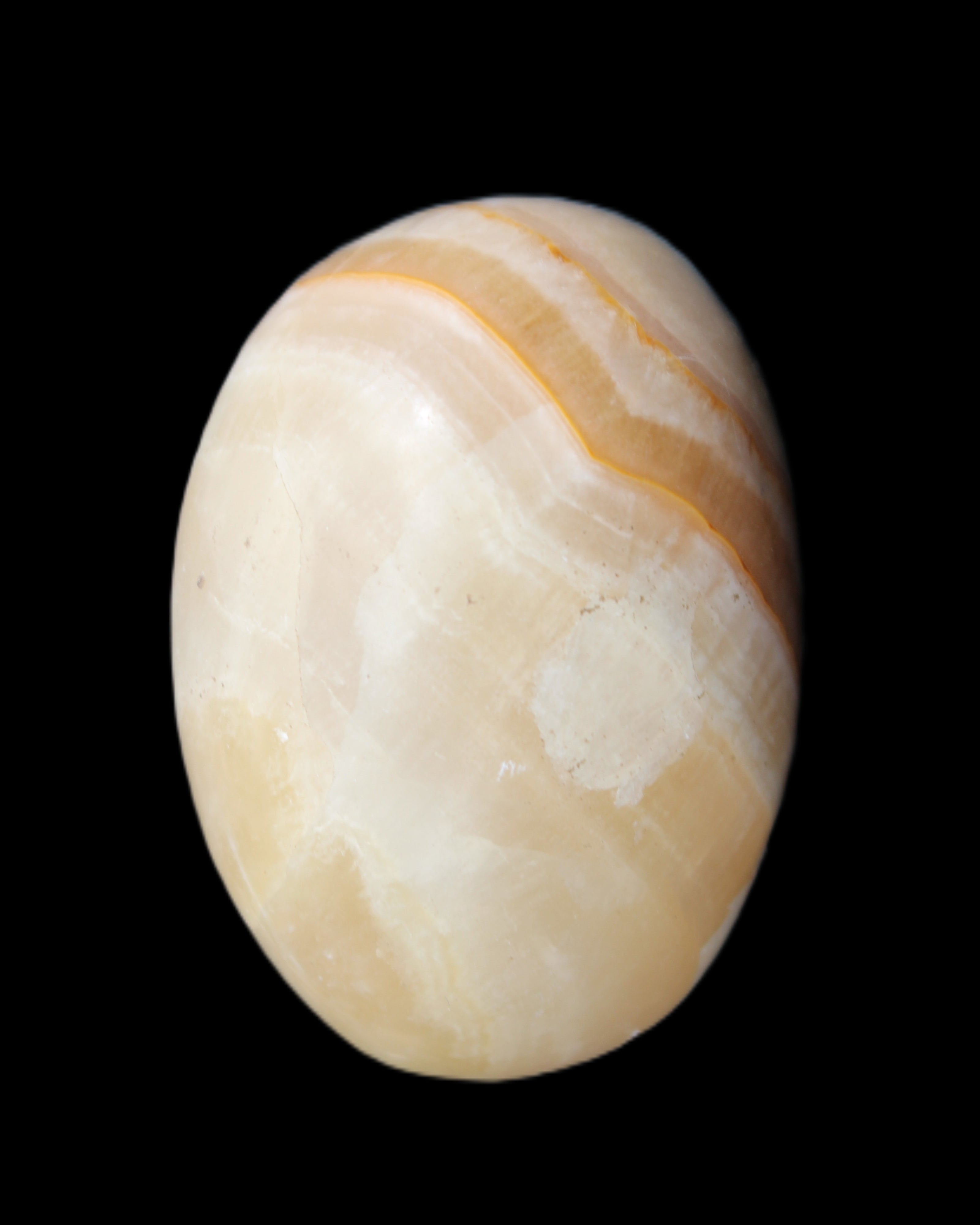 Yellow Banded Calcite egg 118g in sunlight - Rocks and Things Store