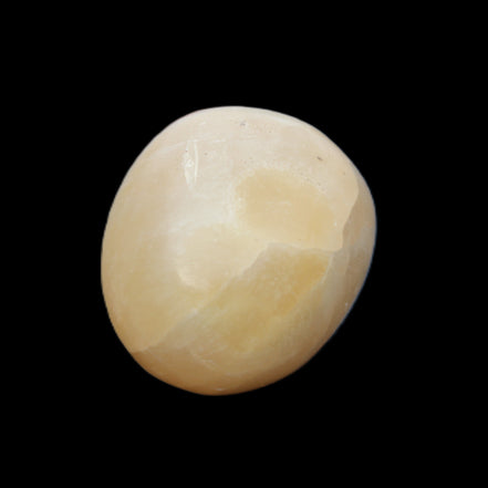 Yellow Afghan Jade onyx egg 118g in sunlight - Rocks and Things Store