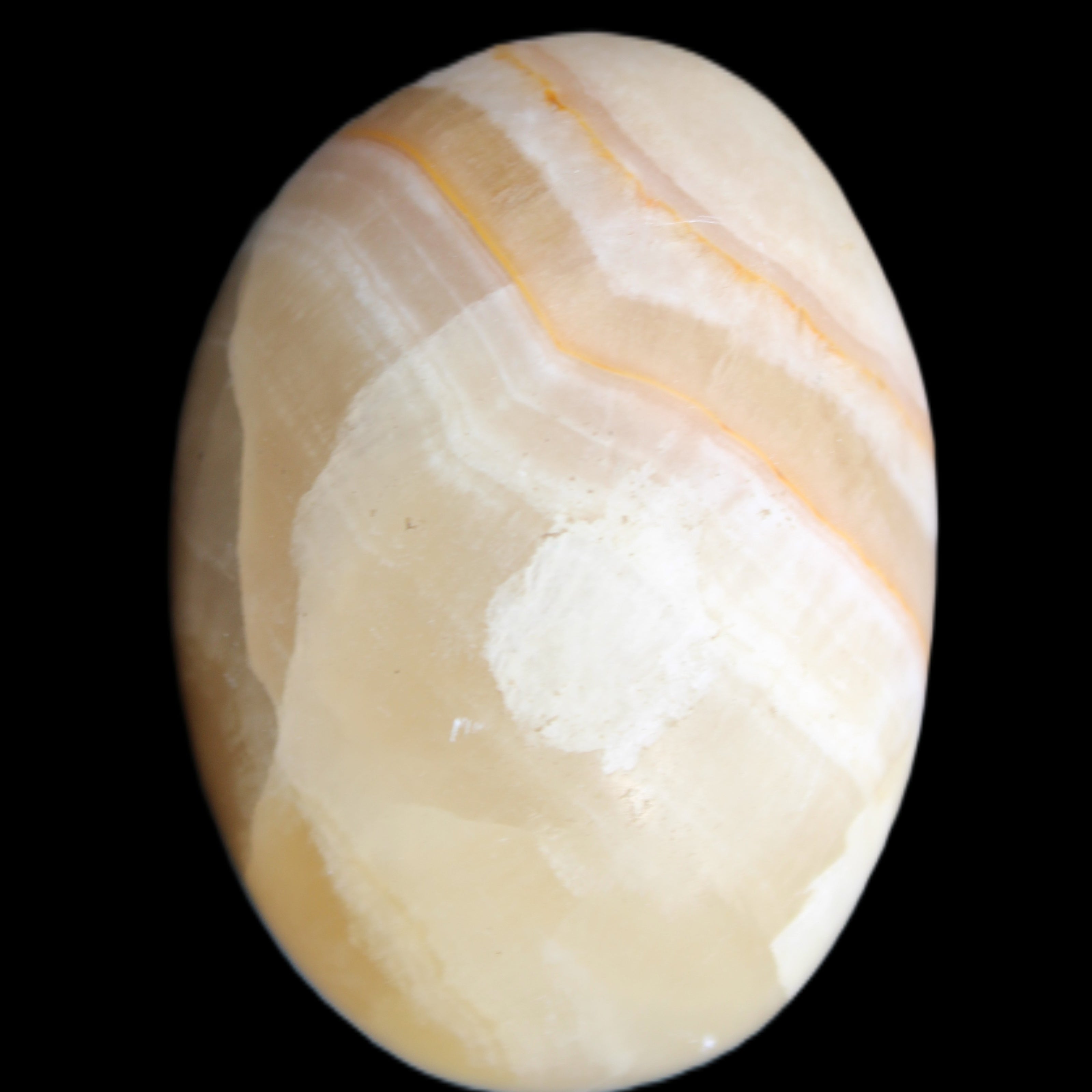 Yellow Banded Calcite egg 118g in sunlight - Rocks and Things Store