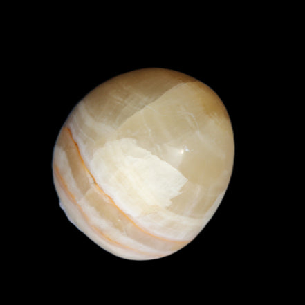 Yellow Afghan Jade onyx egg 118g in sunlight - Rocks and Things Store