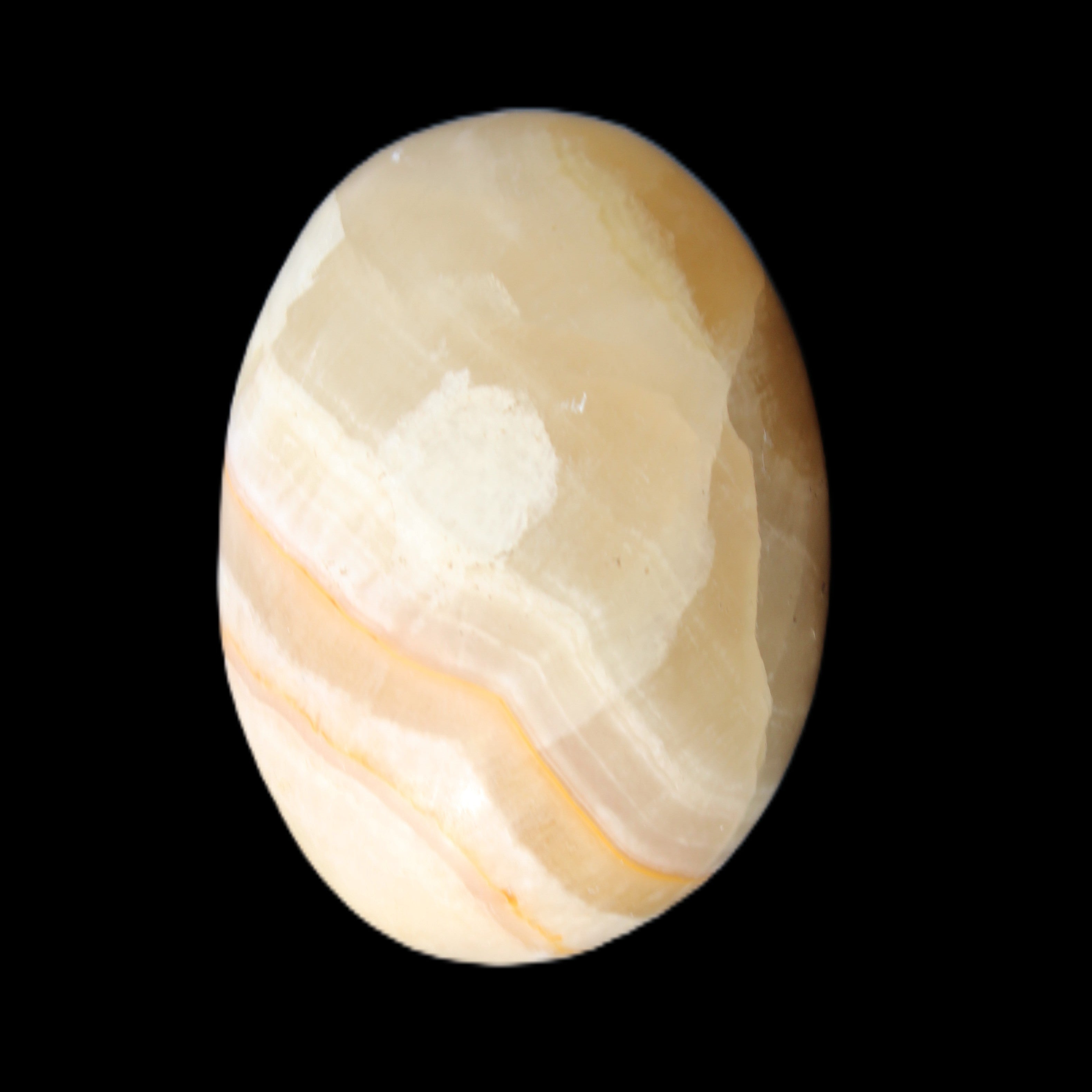 Yellow Afghan Jade onyx egg 118g in sunlight - Rocks and Things Store