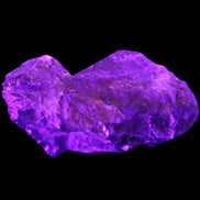 Dark Fenster Smoky Quartz 62g in UV light - Rocks and Things Store