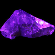 Dark Fenster Smoky Quartz 62g in UV light - Rocks and Things Store