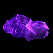 Dark Fenster Smoky Quartz 62g in UV light - Rocks and Things Store