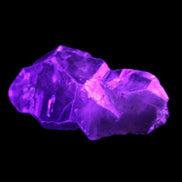 Dark Fenster Smoky Quartz 62g in UV light - Rocks and Things Store