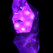 Dark Fenster Smoky Quartz 62g in UV light - Rocks and Things Store