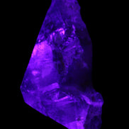 Dark Fenster Smoky Quartz 62g in UV light - Rocks and Things Store