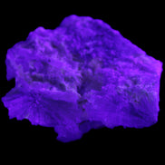 Floral Green Tourmaline with Elestial Quartz 57*56*24mm 75g in UV light - Rocks and Things Store