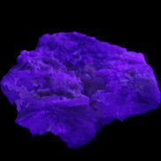 Floral Green Tourmaline with Elestial Quartz 57*56*24mm 75g in UV light - Rocks and Things Store