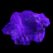 Floral Green Tourmaline with Elestial Quartz 57*56*24mm 75g in UV light - Rocks and Things Store