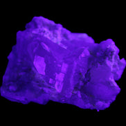 Floral Green Tourmaline with Elestial Quartz 57*56*24mm 75g in UV light - Rocks and Things Store