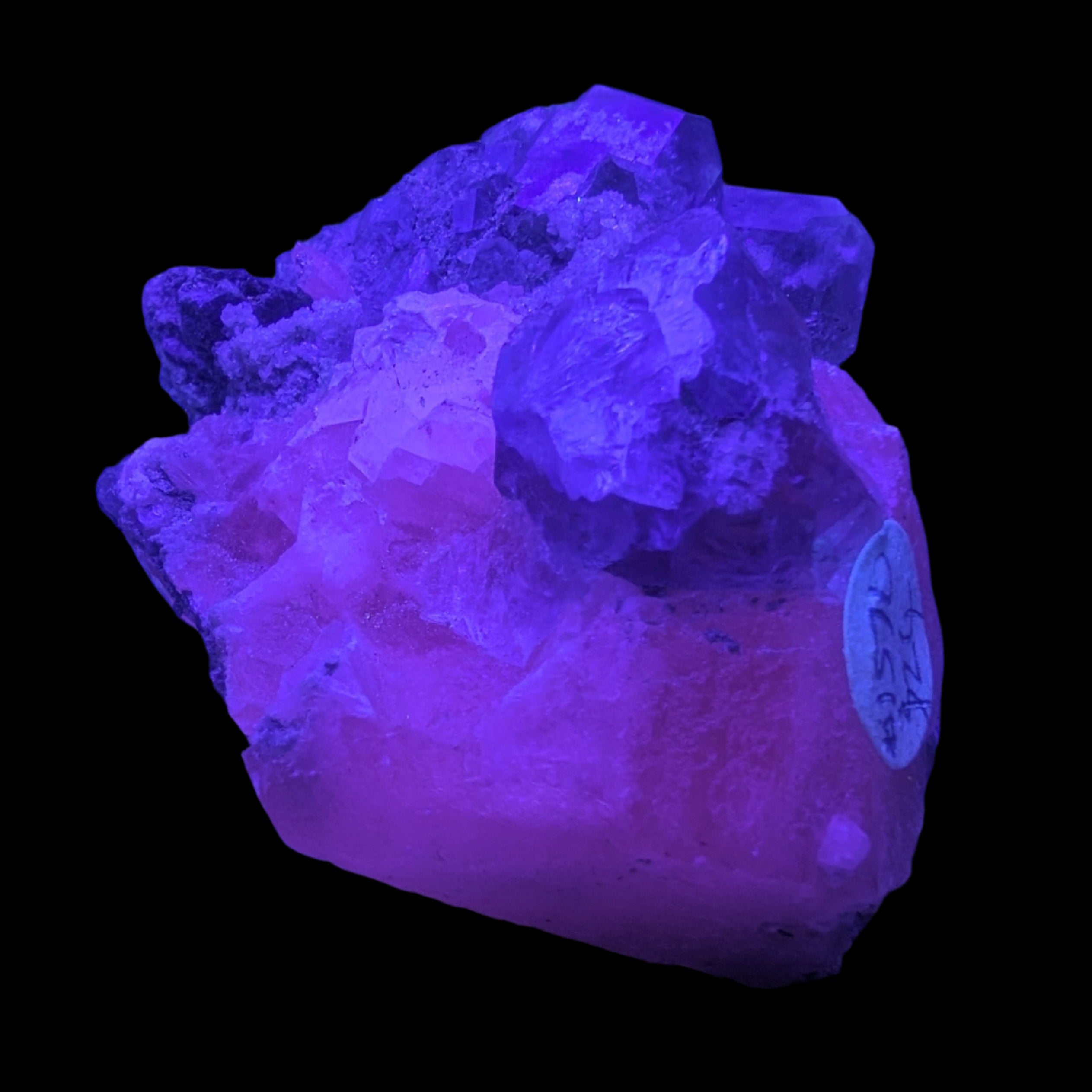 Calcite with Purple Fluorite cluster 103g  in UV light - Rocks and Things Store
