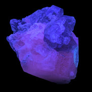 Calcite with Purple Fluorite cluster 103g  in UV light - Rocks and Things Store