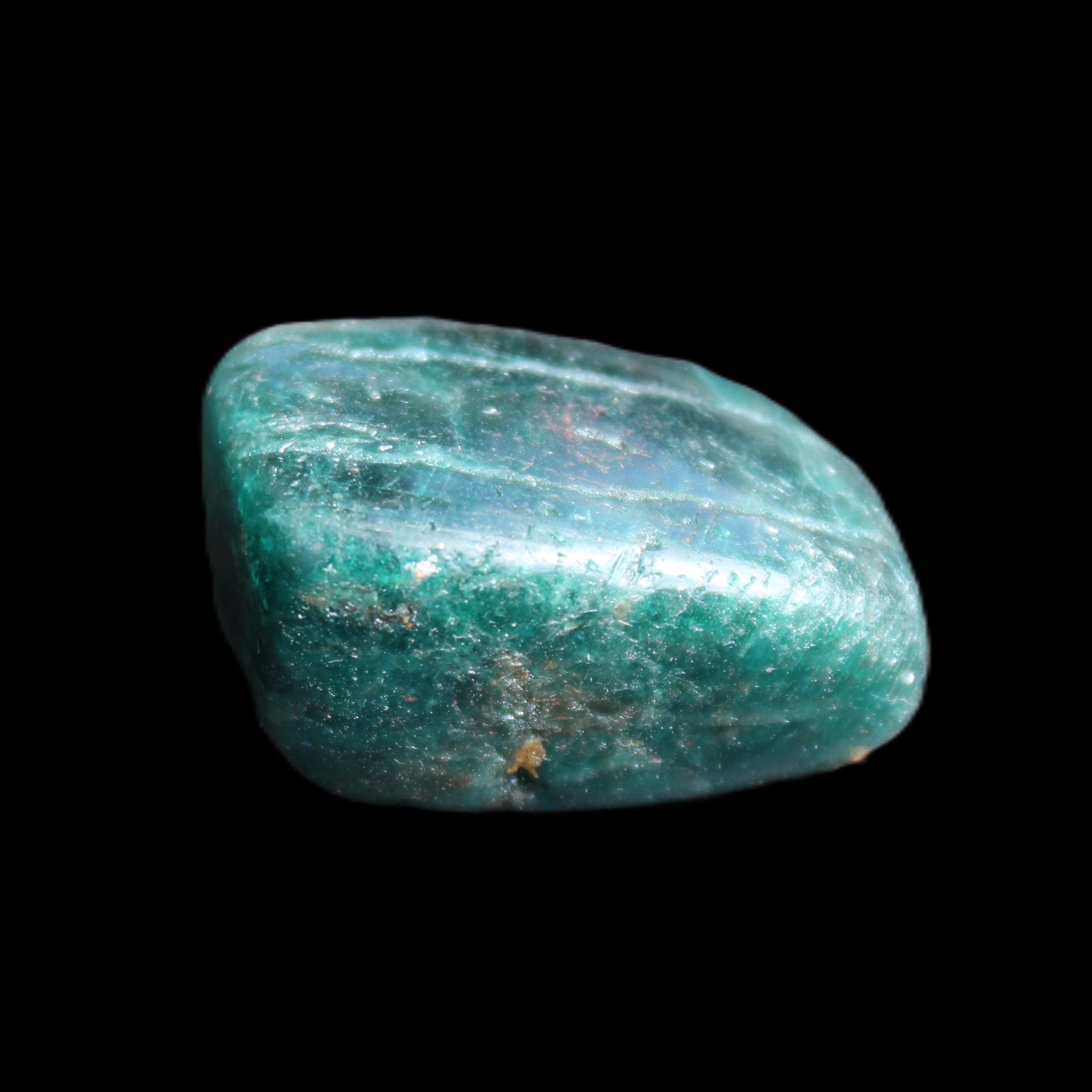 Blue Apatite tumbled stone 12-13g in sunlight - Rocks and Things Store