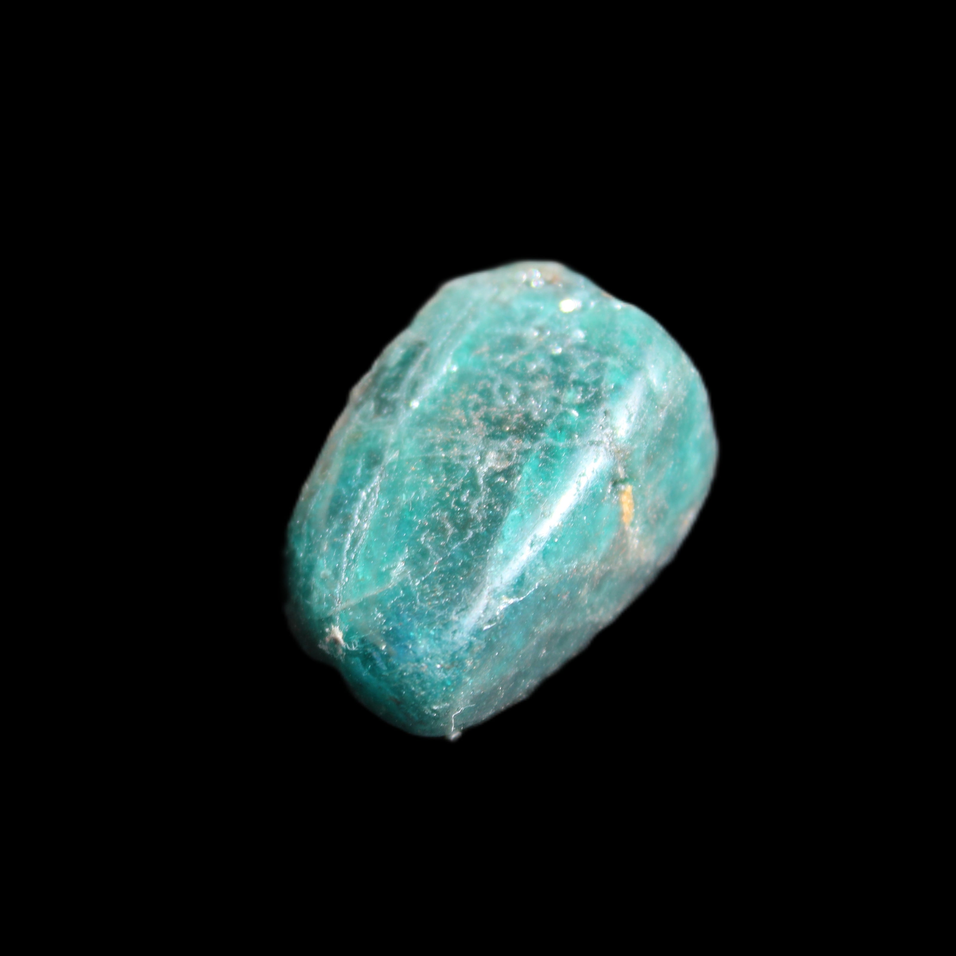 Blue Apatite tumbled stone 12-13g in sunlight - Rocks and Things Store