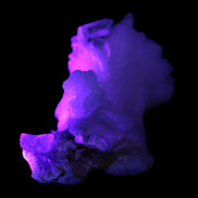 Apophyllite and Calcite Zeolite 77g in UV light -  Rocks and Things Store