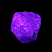 Blue Sapphire (unheated) 41g in UV light - Rocks and Things Store