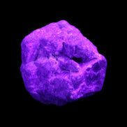 Blue Sapphire (unheated) 41g in UV light - Rocks and Things Store