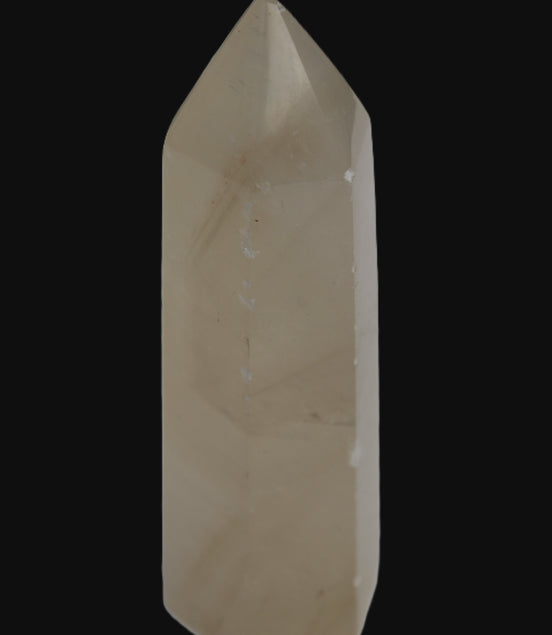Yellow Calcite spar obelisk from Iceland 216g in sunlight Rocks and Things Store