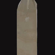 Yellow Calcite spar obelisk from Iceland 216g in sunlight Rocks and Things Store