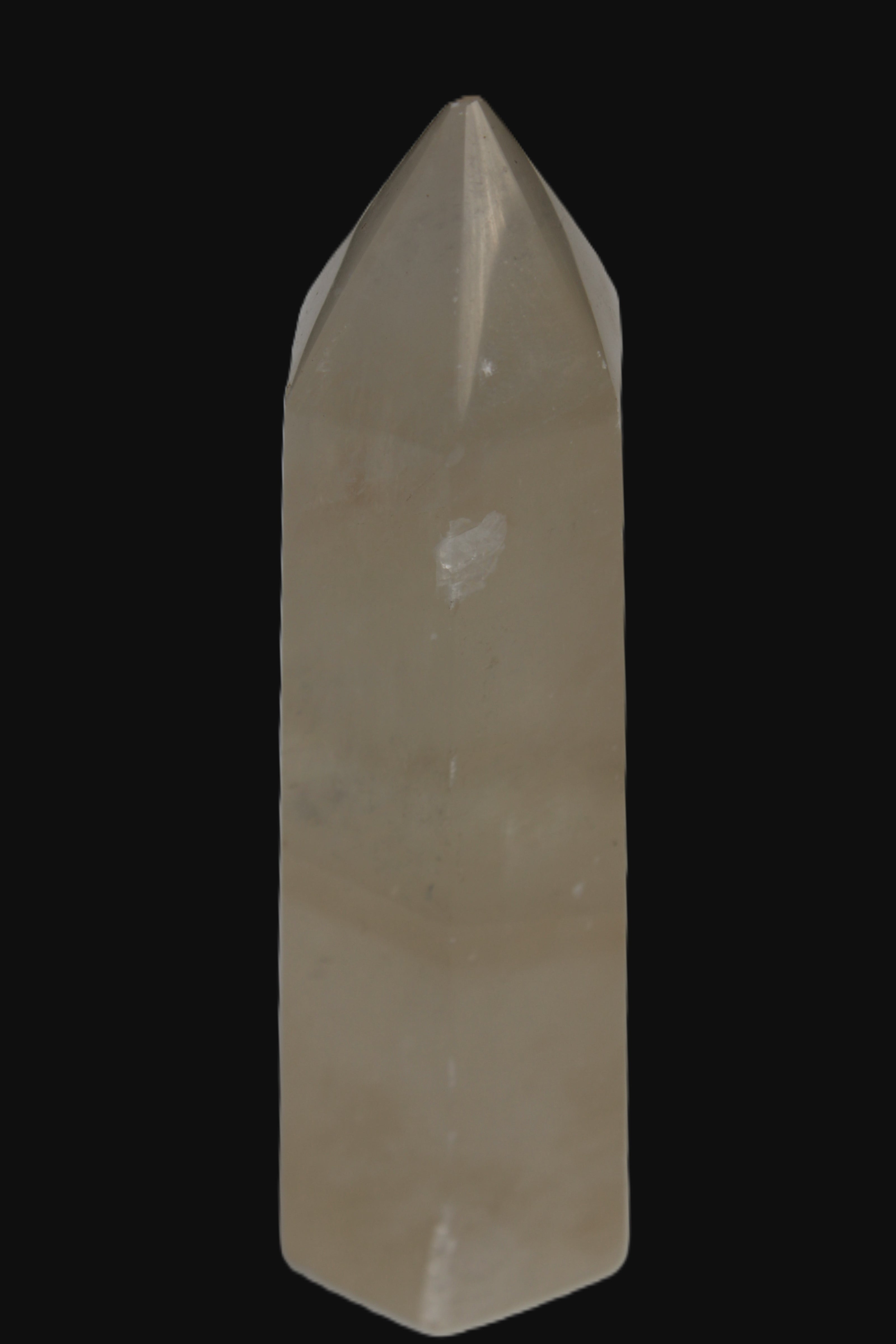 Yellow Calcite spar obelisk from Iceland 216g in sunlight Rocks and Things Store