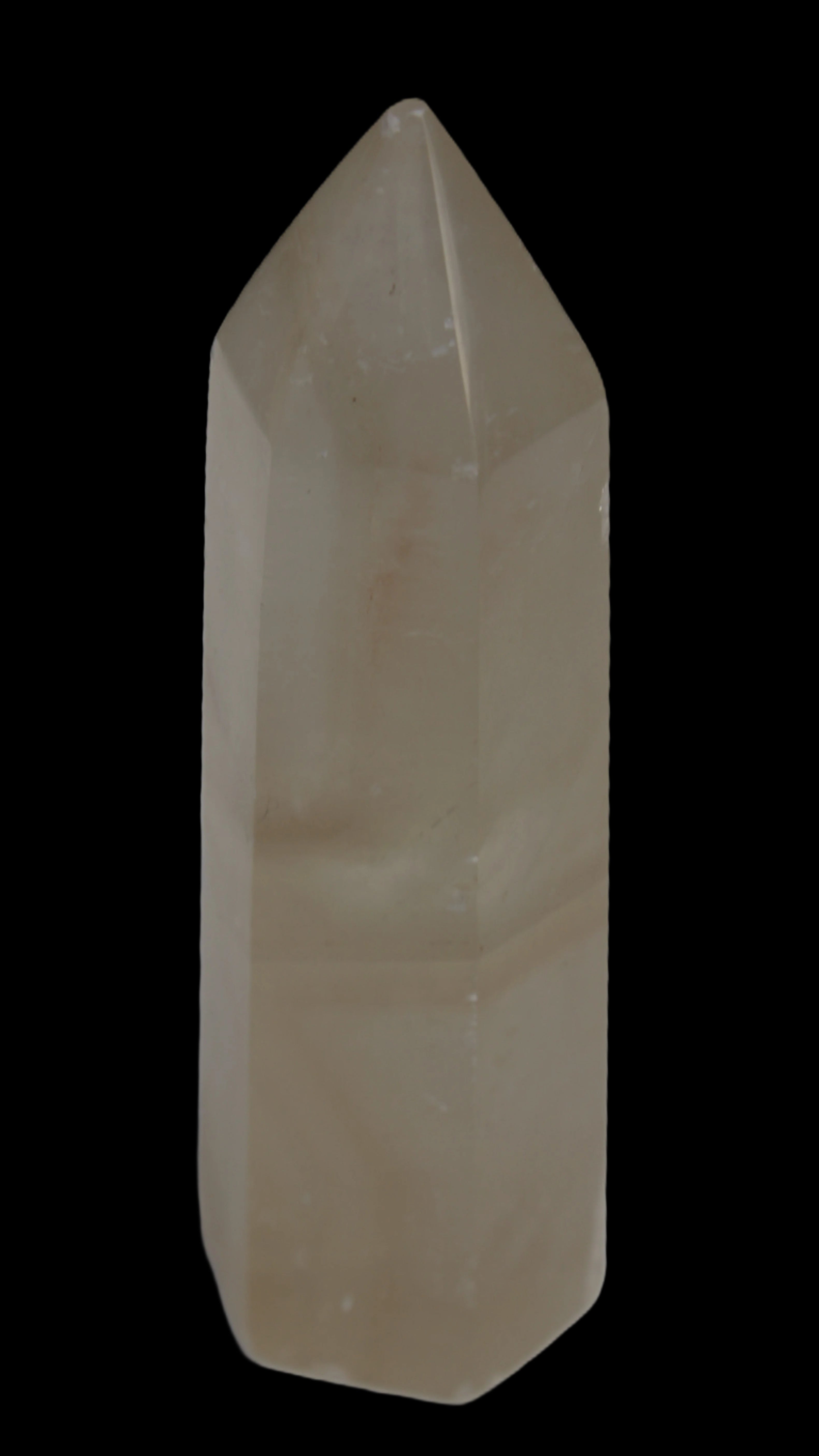 Yellow Calcite spar obelisk from Iceland 216g in sunlight Rocks and Things Store