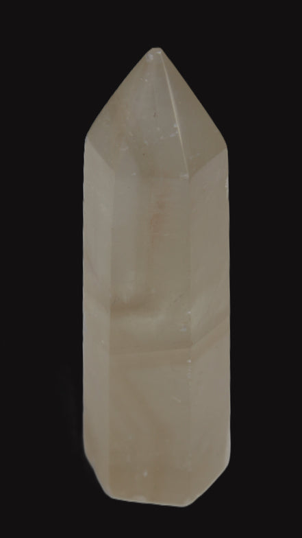 Yellow Calcite spar obelisk from Iceland 216g in sunlight Rocks and Things Store