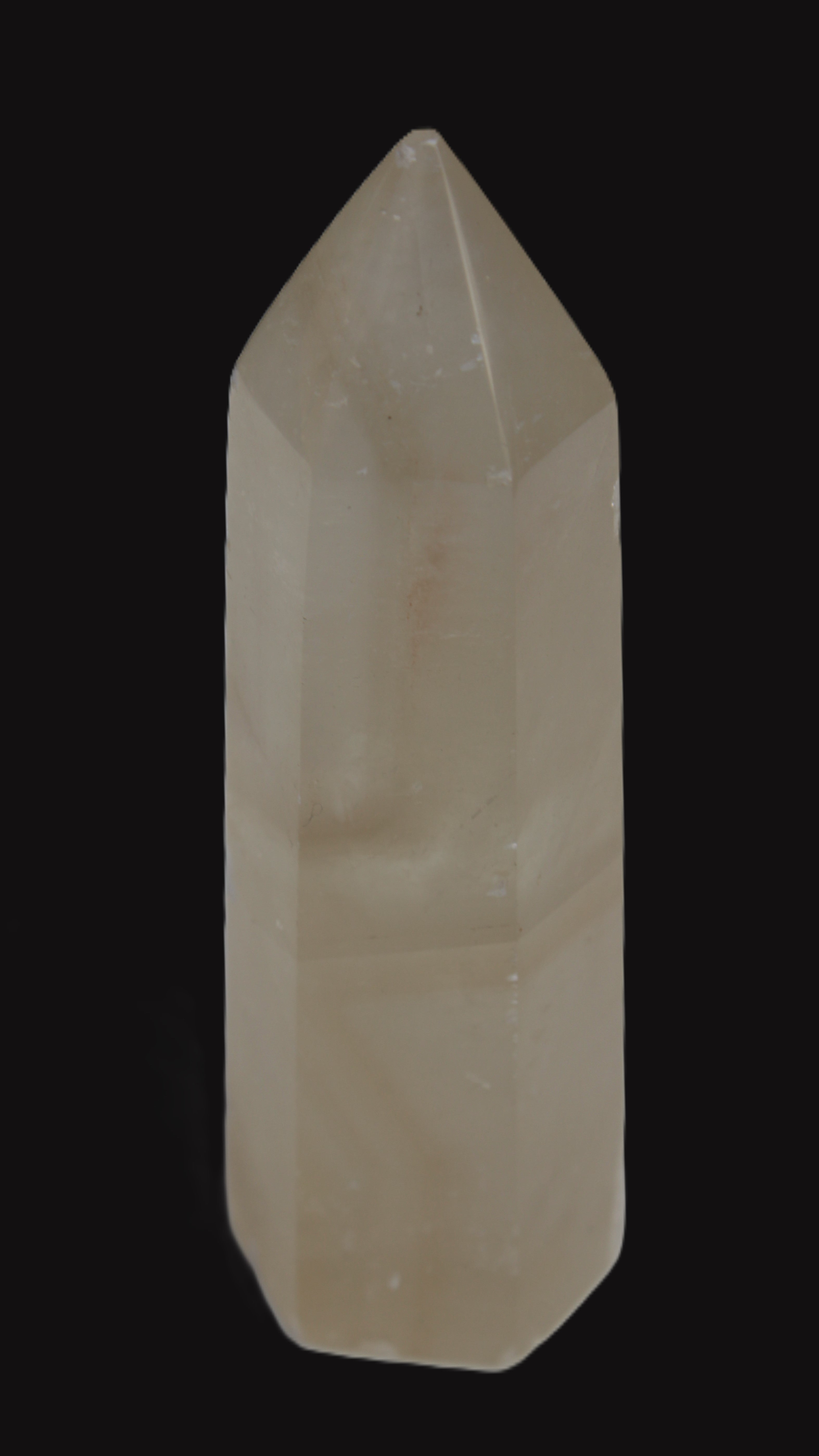Yellow Calcite spar obelisk from Iceland 216g in sunlight Rocks and Things Store