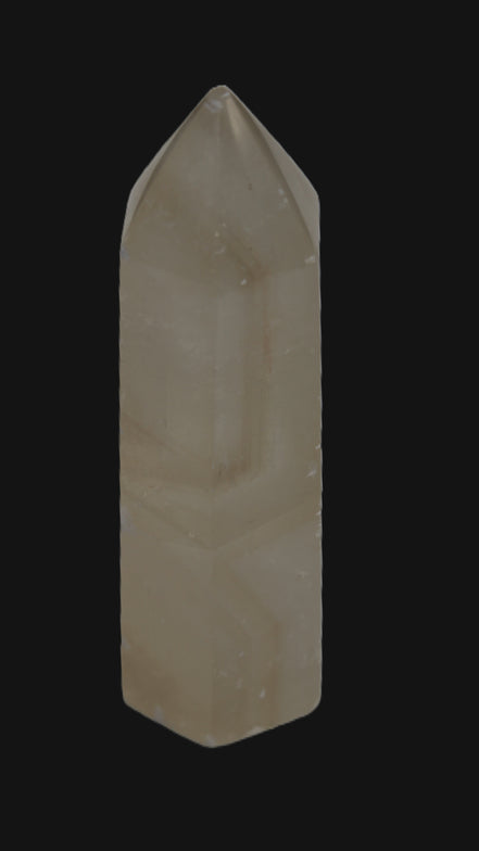 Yellow Calcite spar obelisk from Iceland 216g in sunlight Rocks and Things Store