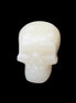 Honey Calcite skull hand-carved 55*47*38mm 183g in sunlight - Rocks and Things Store