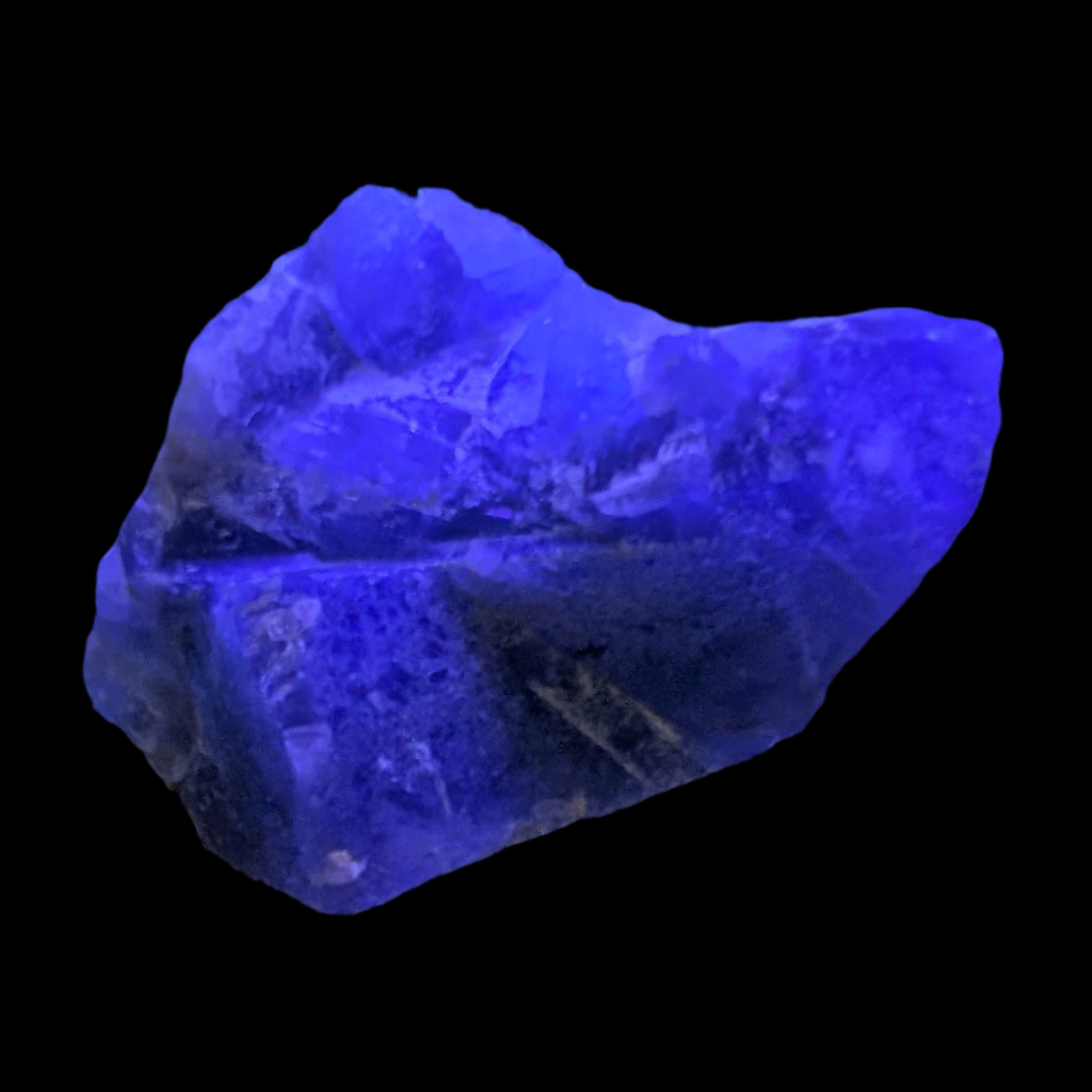 Fluorite cubic cluster UV reactive 328g in UV light -  Rocks and Things Store