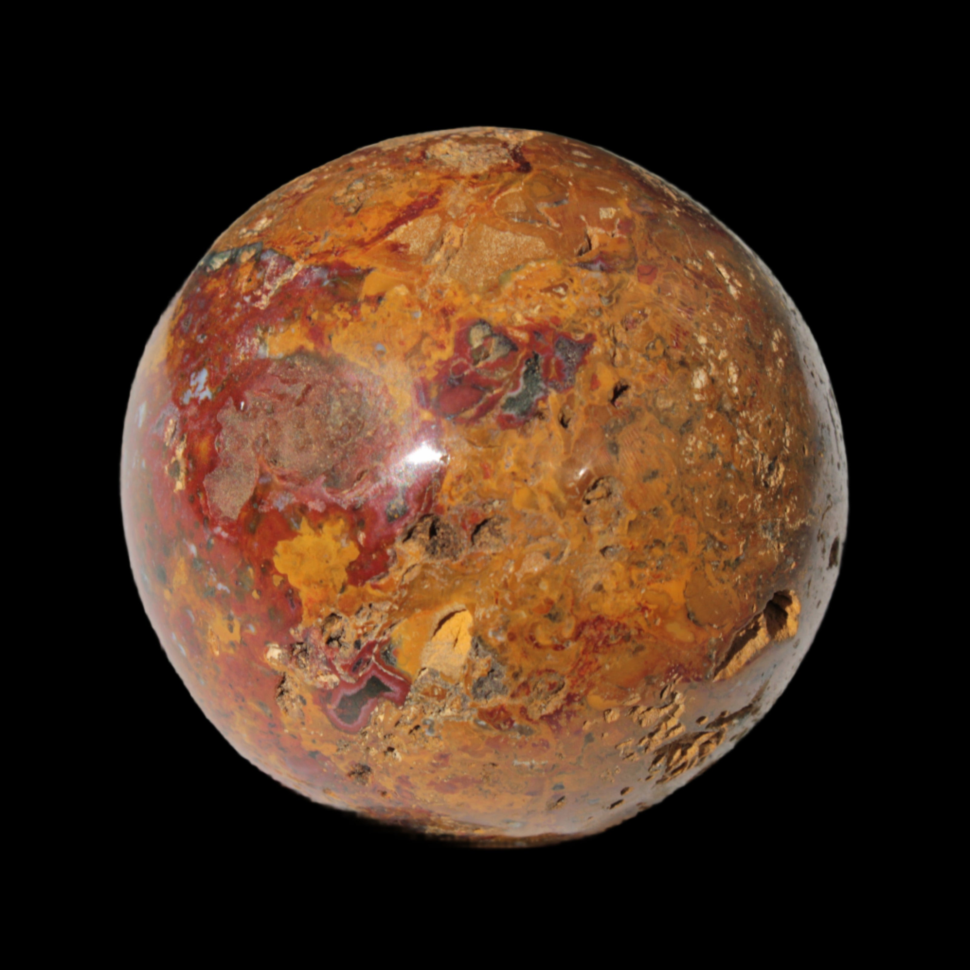Teardrop Jasper sphere 313g in sunlight - Rocks and Things Store