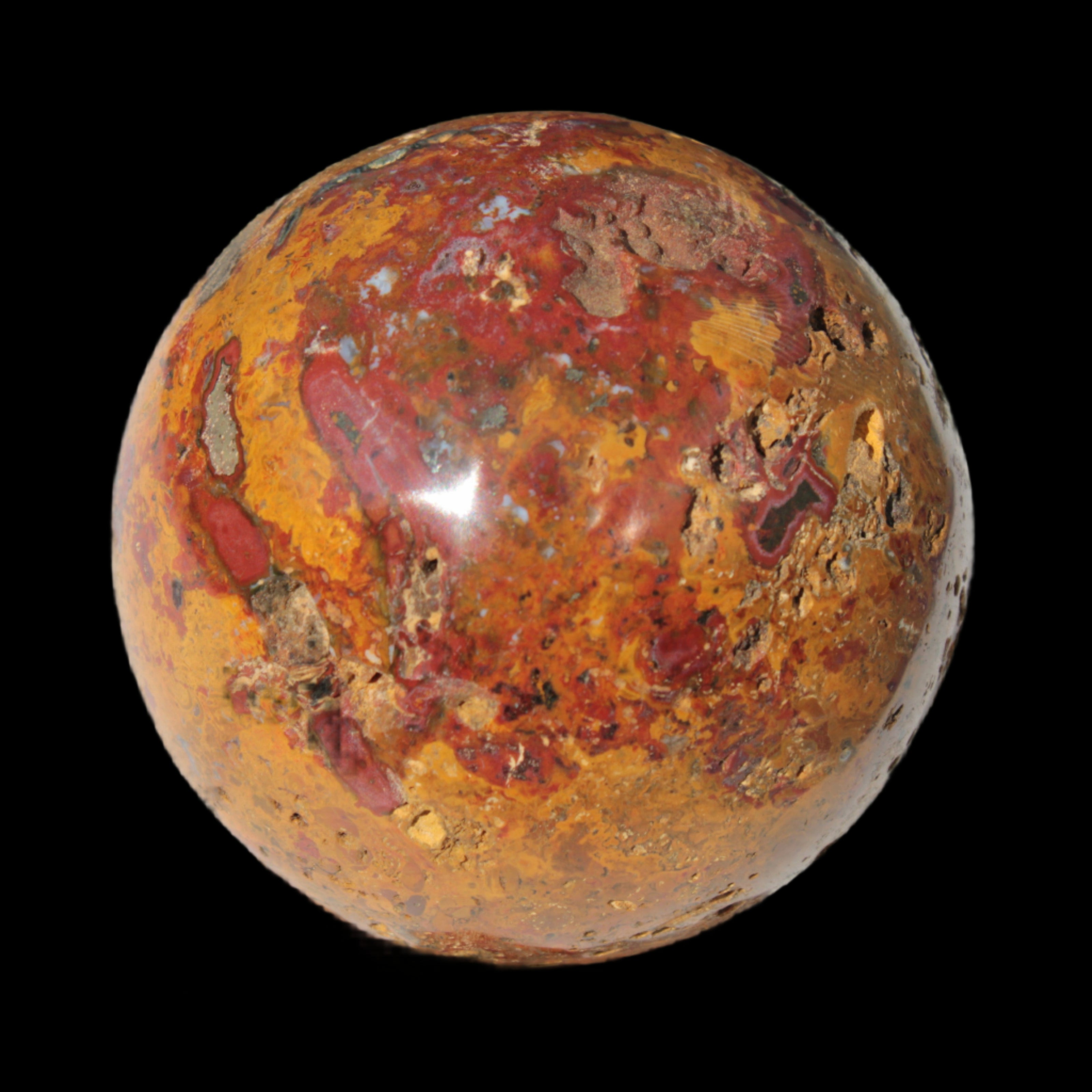 Teardrop Jasper sphere 313g in sunlight - Rocks and Things Store