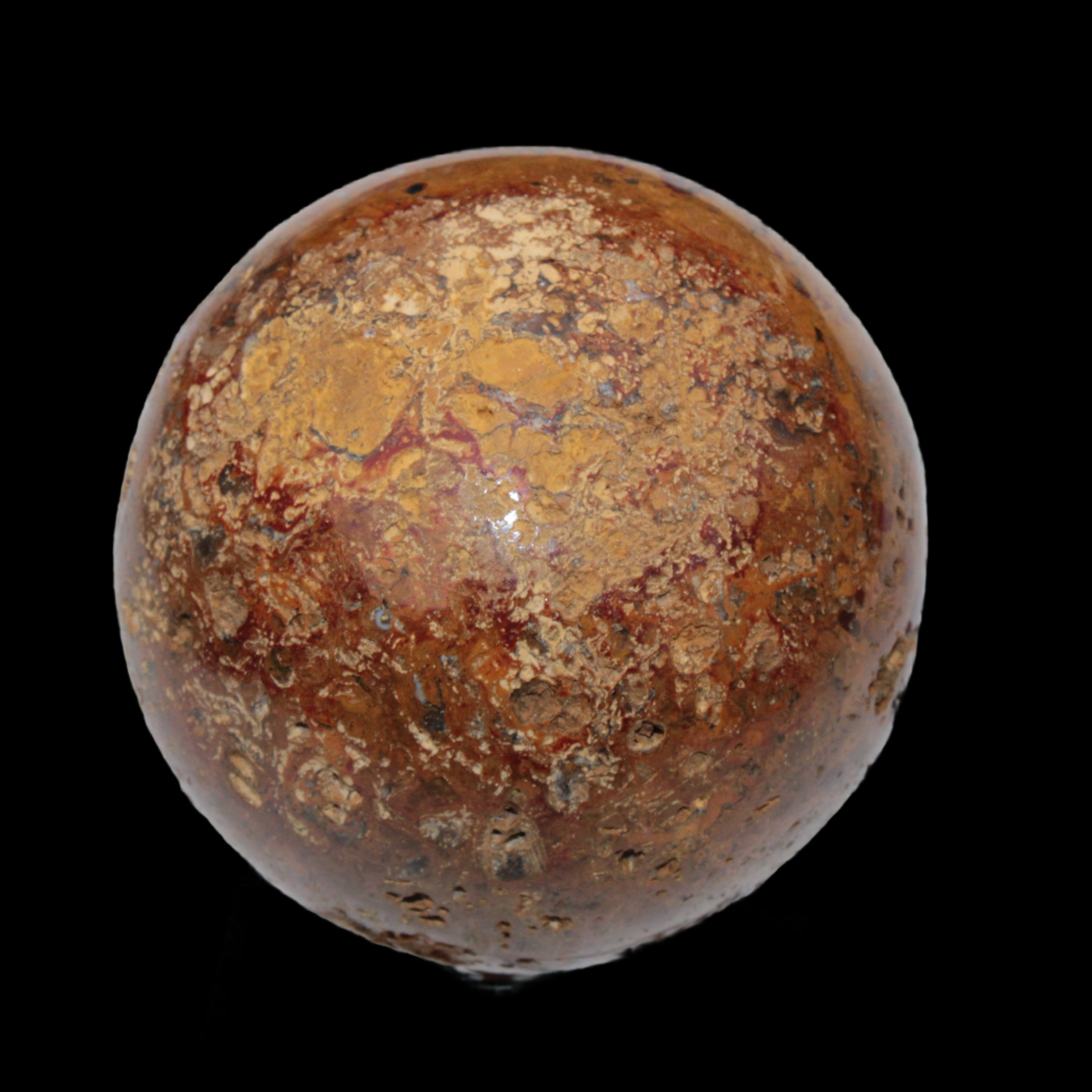 Teardrop Jasper sphere 313g in sunlight - Rocks and Things Store